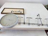 clock, sign and coat rack overview