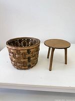 Basket and stand side by side
