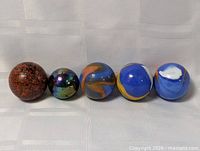 Group view of all five large marbles
