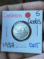 Obverse of 1937 Canada 5¢ coin showing King George VI portrait in coin flip