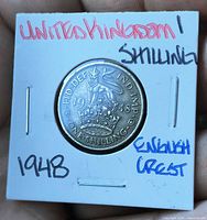 Reverse showing crowned lion of England design with date 1948 and denomination