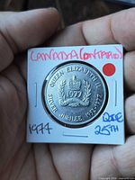 Obverse of 1977 Silver Jubilee coin in 2×2 flip