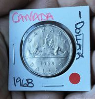 Reverse showing Voyageur canoe design, date 1968, denomination