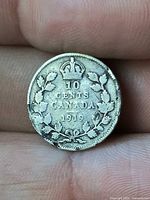 Reverse showing 10 Cents Canada 1919 within maple wreath