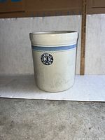 Full view of crock showing blue band and maker stamp