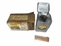 Stove in tin case, cardboard box, spare parts packet