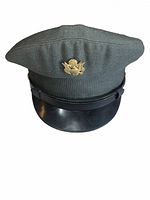 Front view of olive drab US Army service cap with eagle insignia