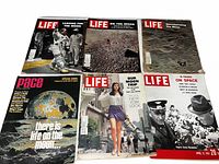 All six magazines laid out front covers visible