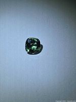 Front view of cushion cut mint green apatite