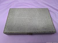 closed textured cardboard case lid
