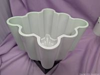 Top view showing fluted cavity and central cone