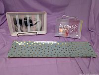 All three ceramic trays displayed together
