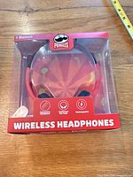 Front view of sealed Pringles Bluetooth wireless headphones packaging