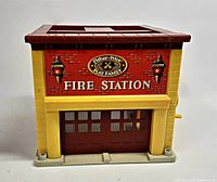 Front view showing Fire Station sign and garage door