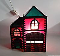 Front view lit showing stained glass colours