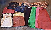Folded jeans, pants, skirts, plaid belts