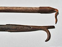 Close of metal hook ends and wood shafts
