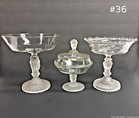 Three glass pieces side by side showing overall forms and size