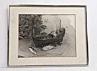 Front view of framed photographic print showing shipwreck scene