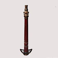 Full view of assembled brass fire nozzle standing upright