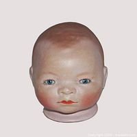 Front view of Grace S Putnam Bye-Lo porcelain doll head
