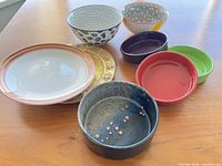 All eight pieces displayed on table