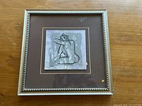 Front view showing frame, mat, and artwork