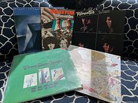 Group shot of five LP jackets