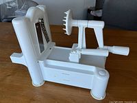 Full view of spiralizer showing hand crank and suction cups