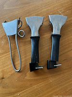 Three jar lifters on table