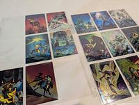 Two 9-pocket pages showing all cards front side