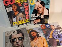 Front view showing all five sealed magazines