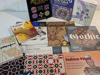 All ten books laid out showing front covers and included CD-ROMs