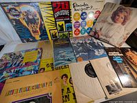 Overview of all LP jackets spread on table