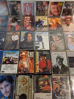 Group shot of assorted country cassette tapes grid layout