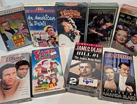 Group shot of all nine sealed VHS boxes
