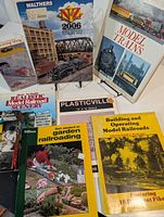 Overall lot showing all books, booklet and VHS