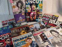 Group view of all magazines showing MOJO, UNCUT and others