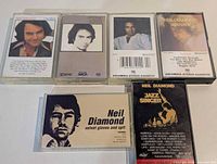 Front covers of all six Neil Diamond cassette tapes
