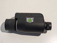 Left side view of Night Vision NV200 monocular showing body and eyepiece