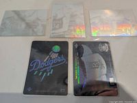 Fronts of all five holographic cards displayed