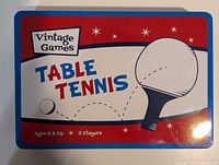 lid of red, white and blue tin marked Vintage Games Table Tennis