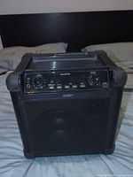 Front and control panel view of black ION Tailgater speaker