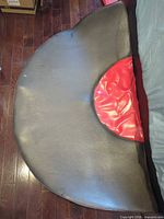 Full view of black surface with red cutout