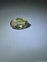 Top view of oval faceted lemon citrine