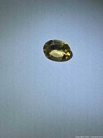 Top view of oval golden yellow citrine