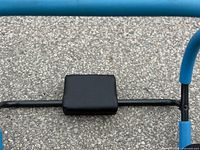 Front view of ab roller showing headrest and frame