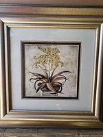 Full view of square framed print with mat and gold frame