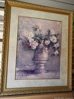 Full view of framed floral print showing artwork and frame