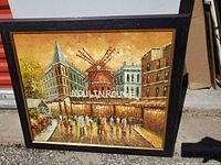 Front view of framed Moulin Rouge oil painting